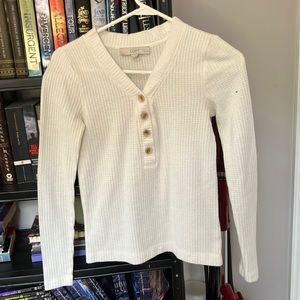 Lightweight white sweater with buttons halfway down